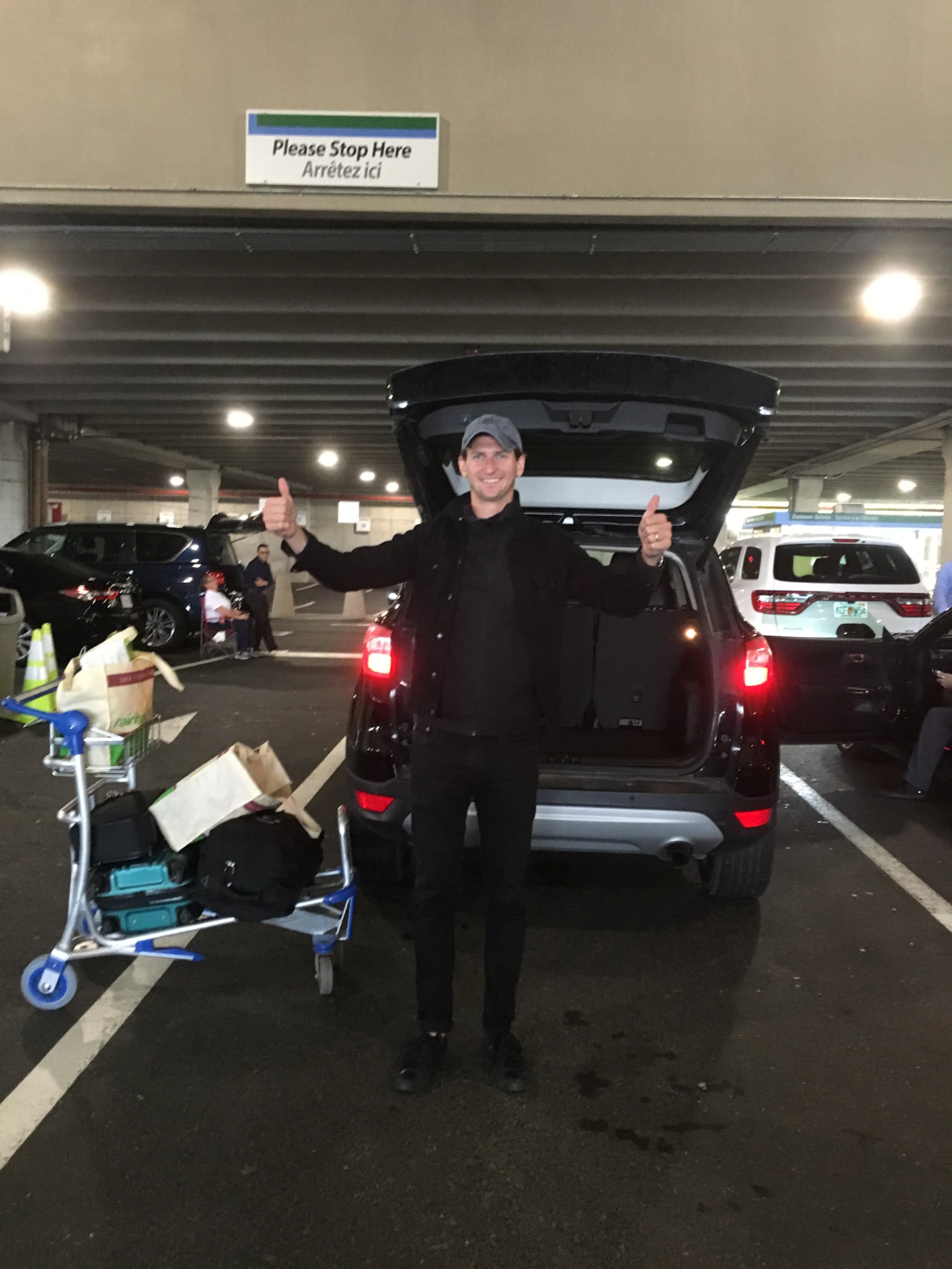 Charles loading up the car on the road